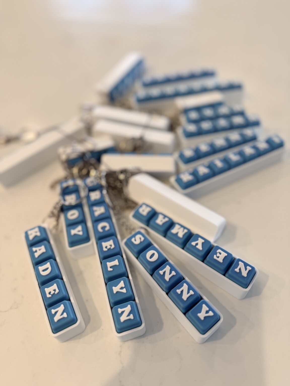 Blue and white personalized AvyMade name tags